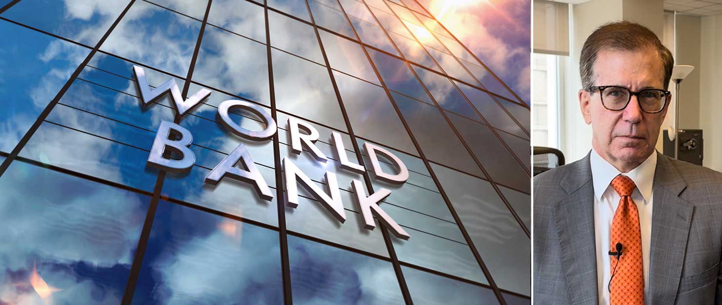 The words "World Bank" on a glass building next to a portrait of Christopher H. Stephens, the World Bank Group’s senior vice president and general counsel, and the subject of this interview